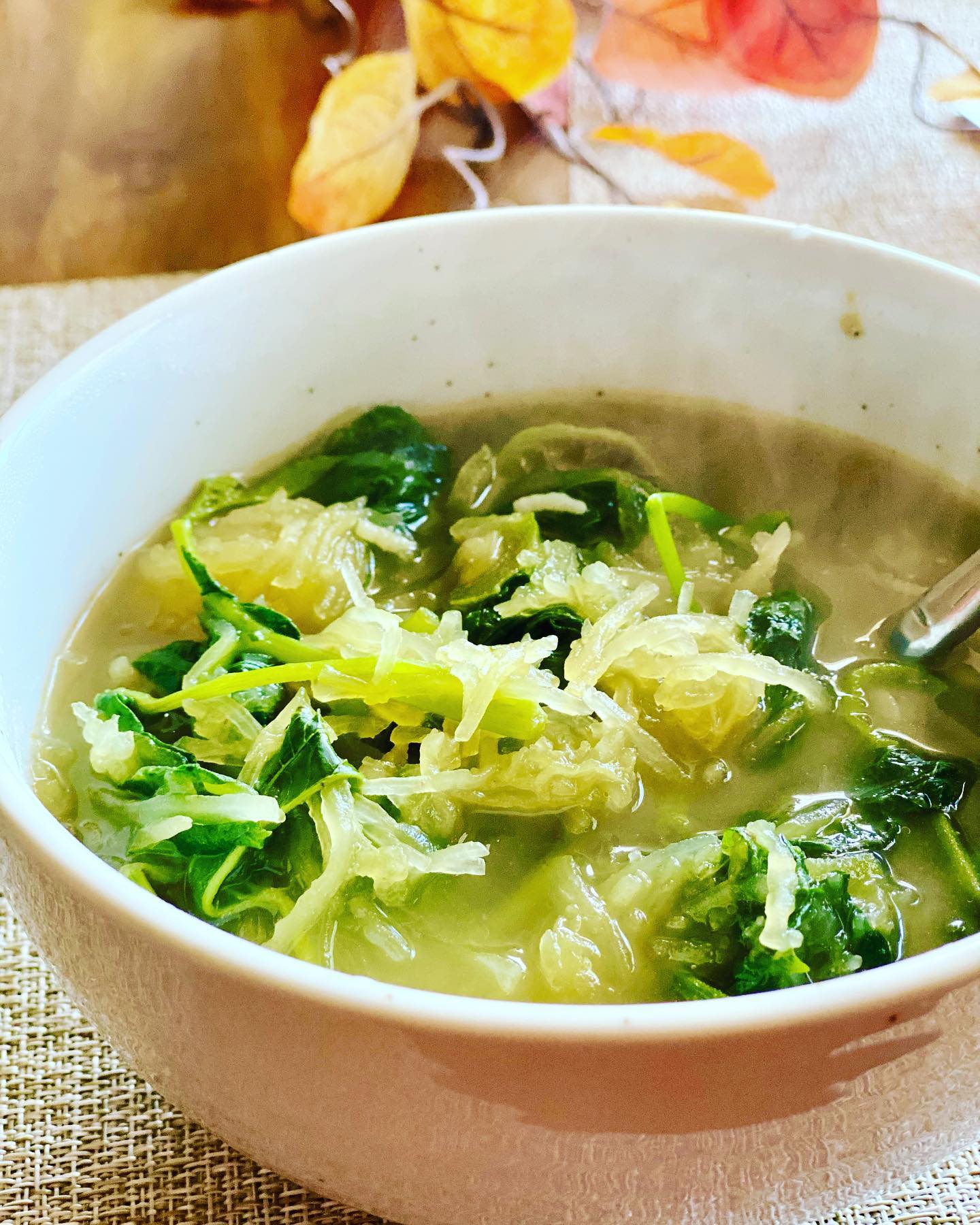 Spaghetti squash and greens (yam leaves) in nutritious broth