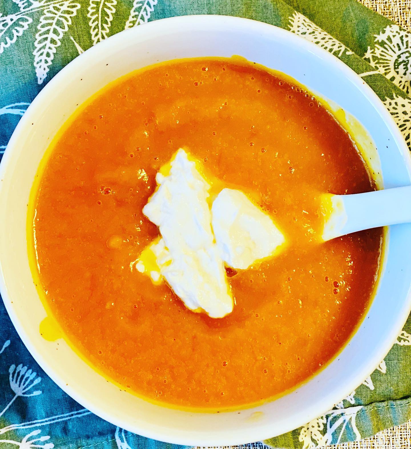 Pumpkin soup topped with homemade yogurt