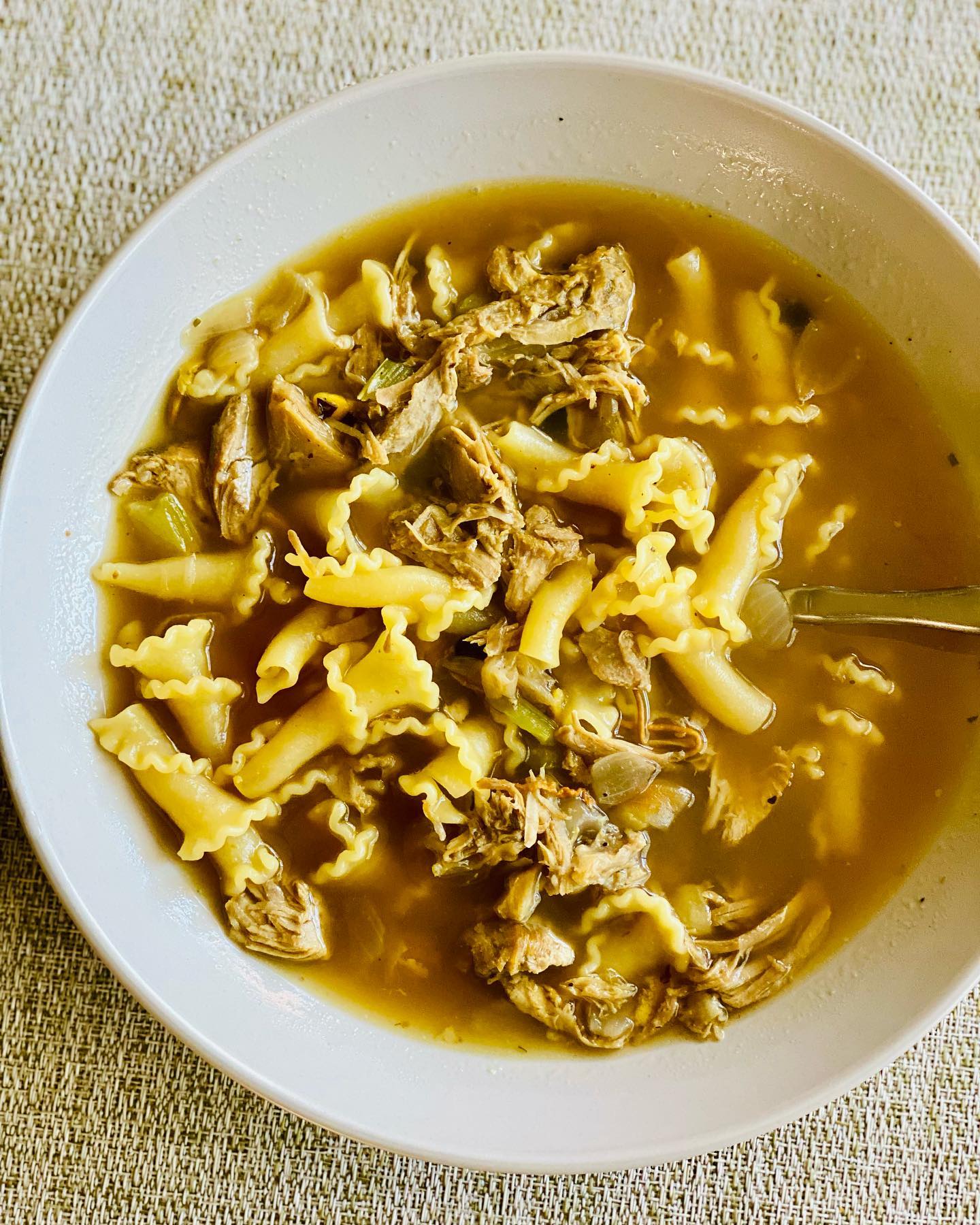 chicken noodle soup with lots of peppers