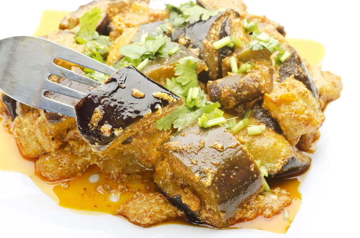 Curried Potatoes and Mushroom with Eggplant in Clay