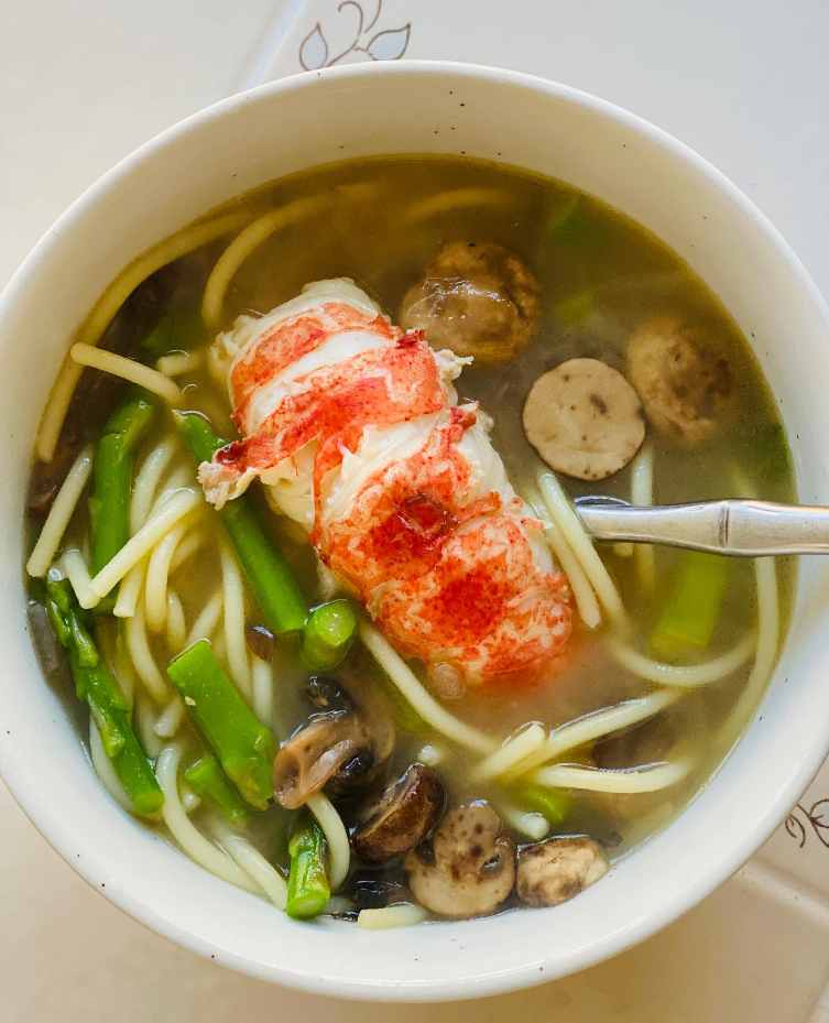 Lobster mushroom noodle soup with asparagus in turkey bone broth