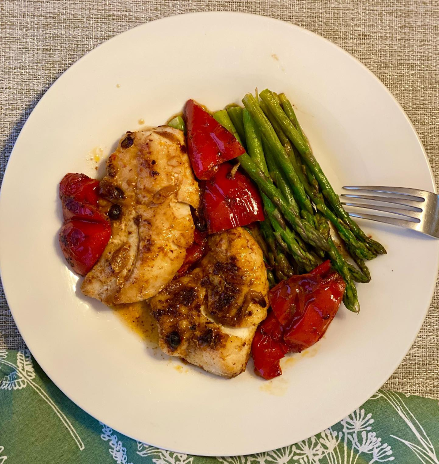 one pot meal with cajun blackened cod, roasted peppers and asparagus.