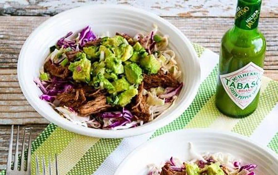 Paleo Friendly Green Chile Shredded Beef over Cabbage Bowl with Guacamole